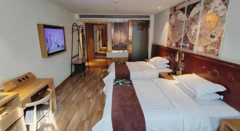 Bed in James Joyce Coffetel Zhengzhou CBD Exhibition Center Provincial People's Hospital