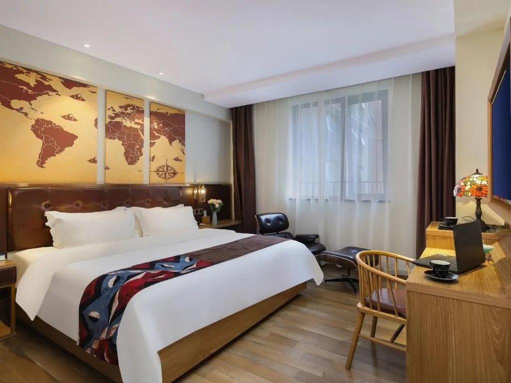 Bed in James Joyce Coffetel Zhengzhou CBD Exhibition Center Provincial People's Hospital