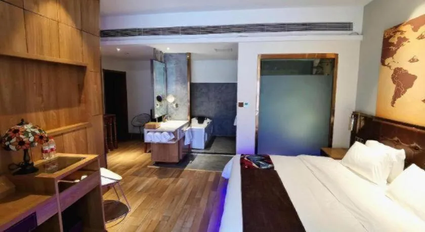 Bed in James Joyce Coffetel Zhengzhou CBD Exhibition Center Provincial People's Hospital