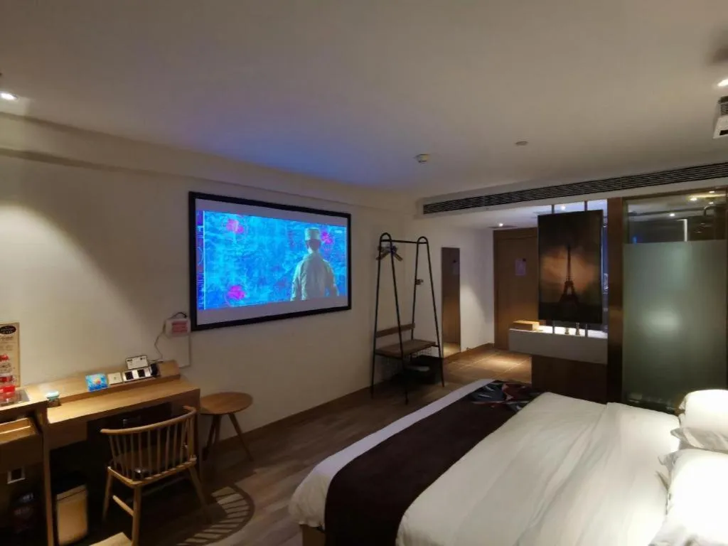 Bed in James Joyce Coffetel Zhengzhou CBD Exhibition Center Provincial People's Hospital