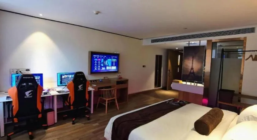 Bed in James Joyce Coffetel Zhengzhou CBD Exhibition Center Provincial People's Hospital