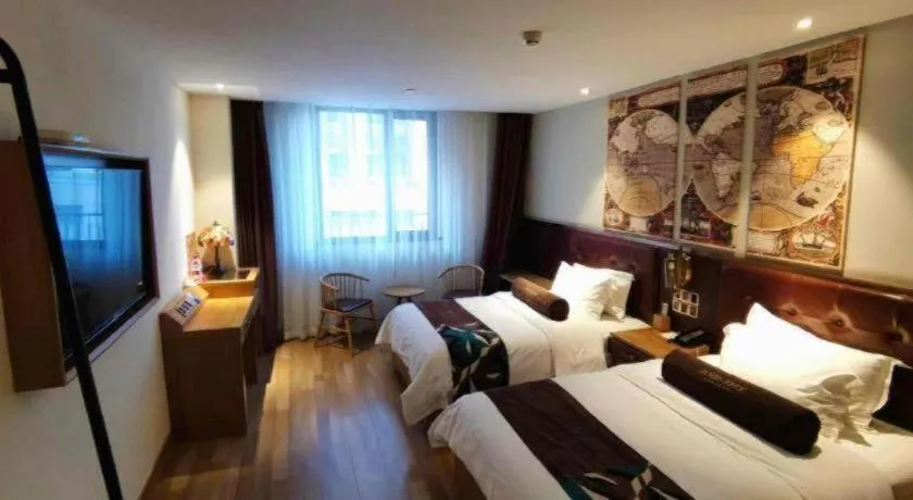 Bed in James Joyce Coffetel Zhengzhou CBD Exhibition Center Provincial People's Hospital