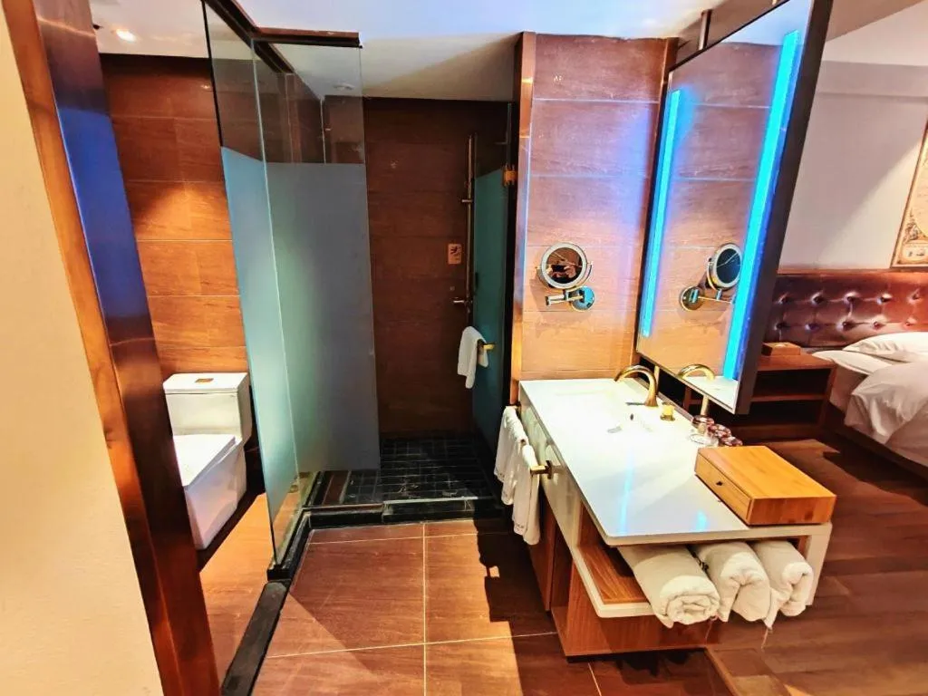 Bed in James Joyce Coffetel Zhengzhou CBD Exhibition Center Provincial People's Hospital