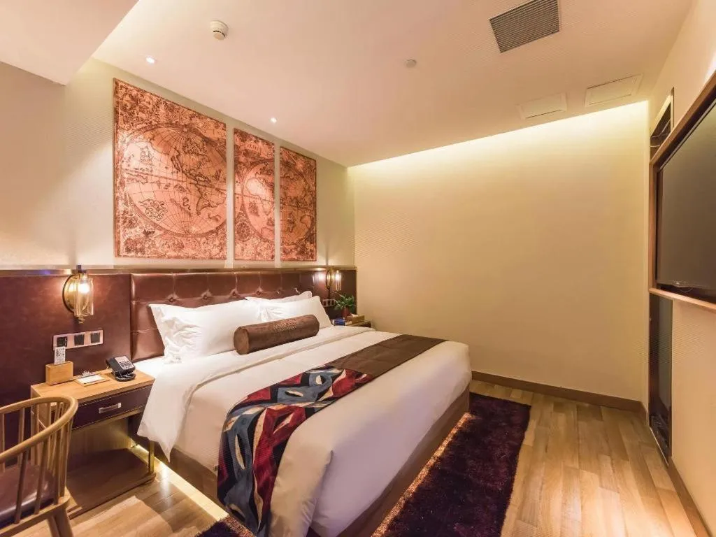 Bed in James Joyce Coffetel Zhengzhou CBD Exhibition Center Provincial People's Hospital