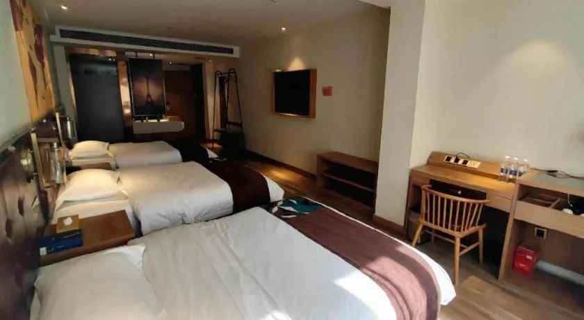 Bed in James Joyce Coffetel Zhengzhou CBD Exhibition Center Provincial People's Hospital