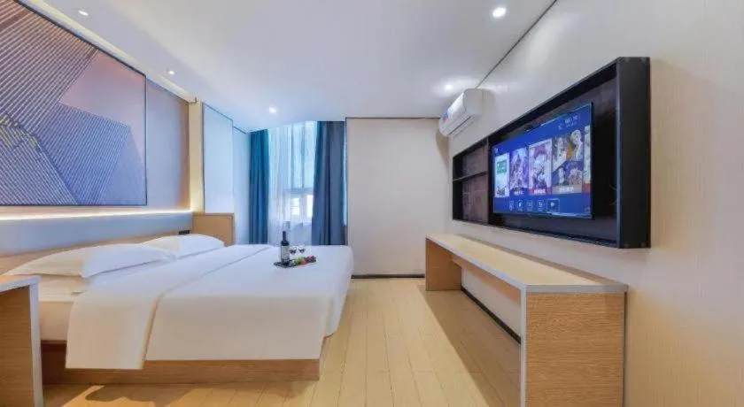 Bed in IU Hotel·Jiayuguan People's Shopping Mall