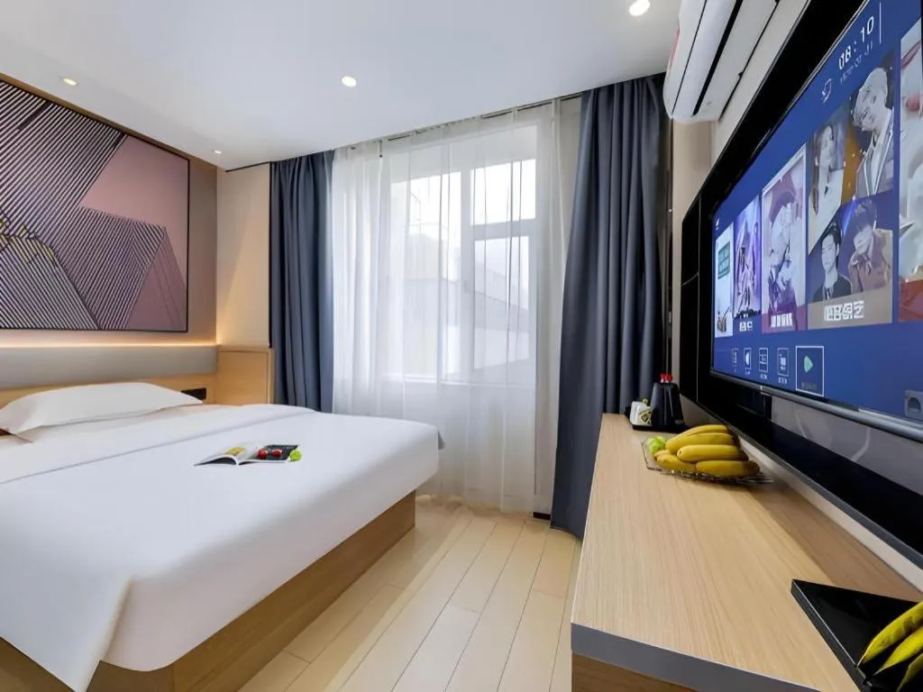 Bed in IU Hotel·Jiayuguan People's Shopping Mall
