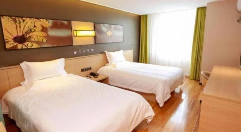 Bed in IU Hotel·Jiayuguan People's Shopping Mall