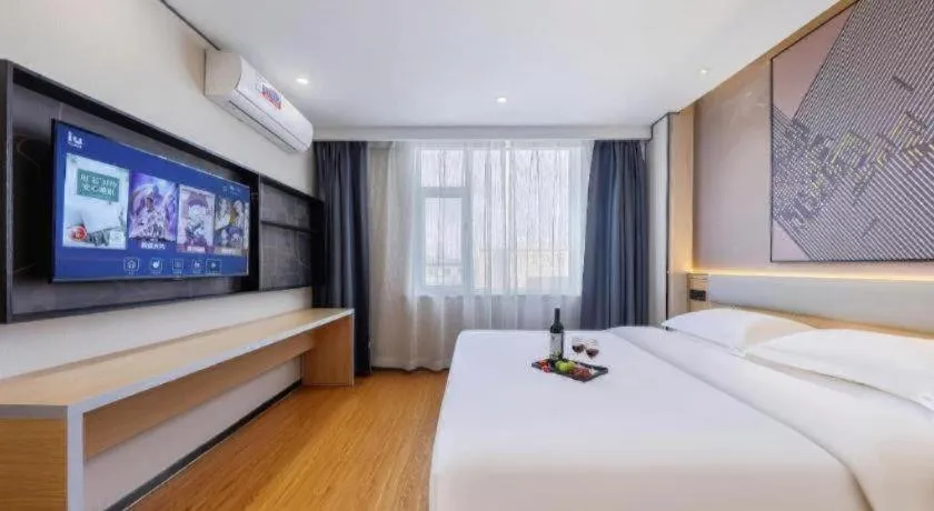 Bed in IU Hotel·Jiayuguan People's Shopping Mall