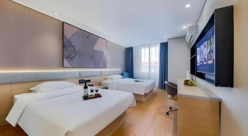 Bed in IU Hotel·Jiayuguan People's Shopping Mall