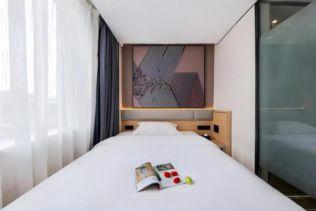 Bed in IU Hotel·Jiayuguan People's Shopping Mall