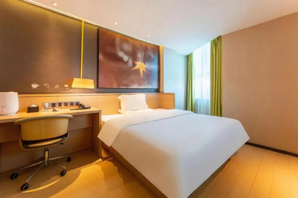 Bed in IU Hotel·Jiayuguan People's Shopping Mall