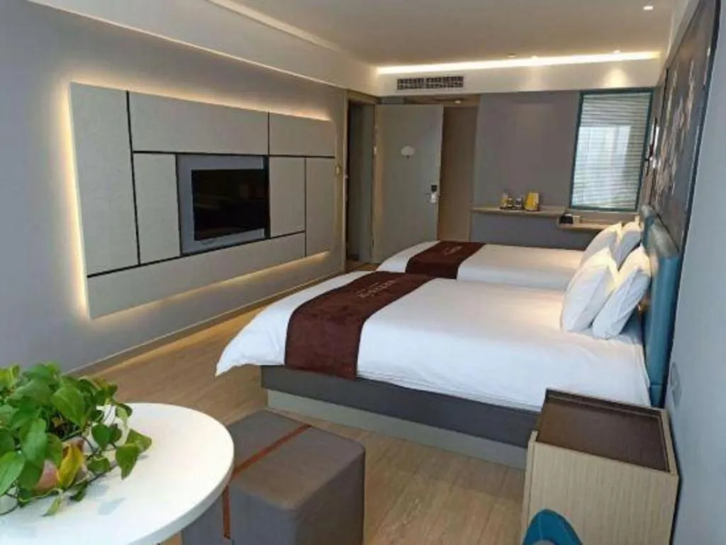 Bed in Magnotel Hotel Anshun West High-Speed Railway Station