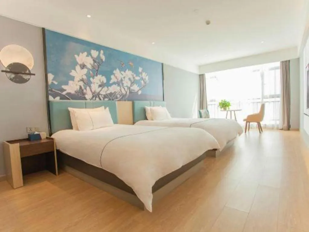 Bed in Magnotel Hotel Anshun West High-Speed Railway Station