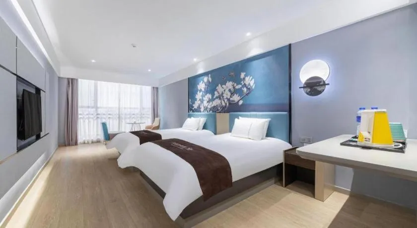 Bed in Magnotel Hotel Anshun West High-Speed Railway Station