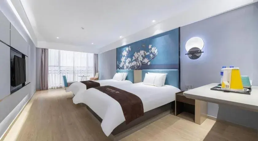 Bed in Magnotel Hotel Anshun West High-Speed Railway Station Bed in Magnotel Hotel Anshun West High-Speed Railway Station