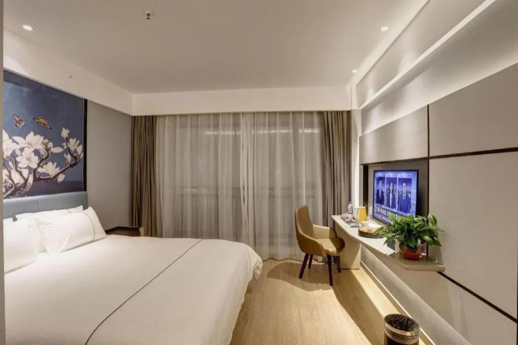 Bed in Magnotel Hotel Anshun West High-Speed Railway Station