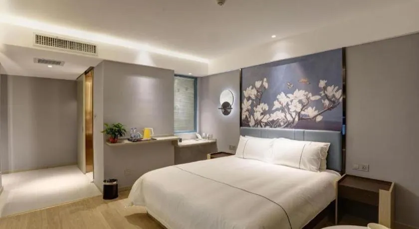 Bed in Magnotel Hotel Anshun West High-Speed Railway Station