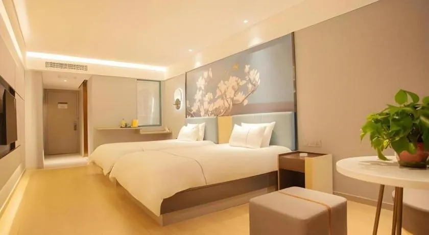 Bed in Magnotel Hotel Anshun West High-Speed Railway Station