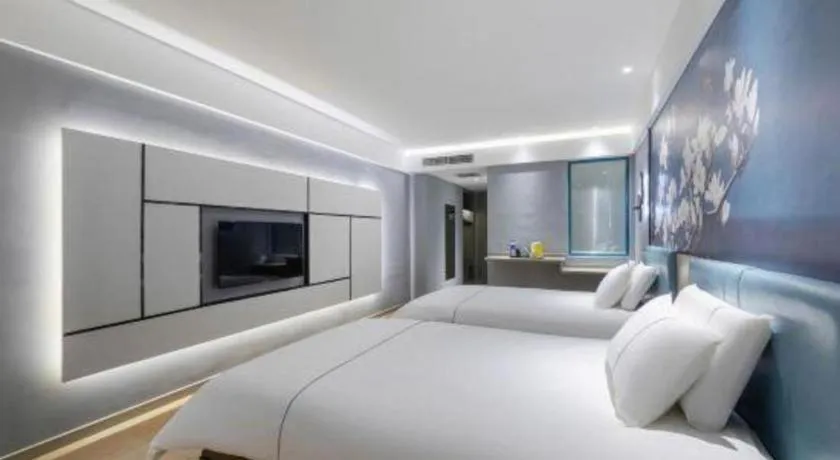 Bed in Magnotel Hotel Anshun West High-Speed Railway Station