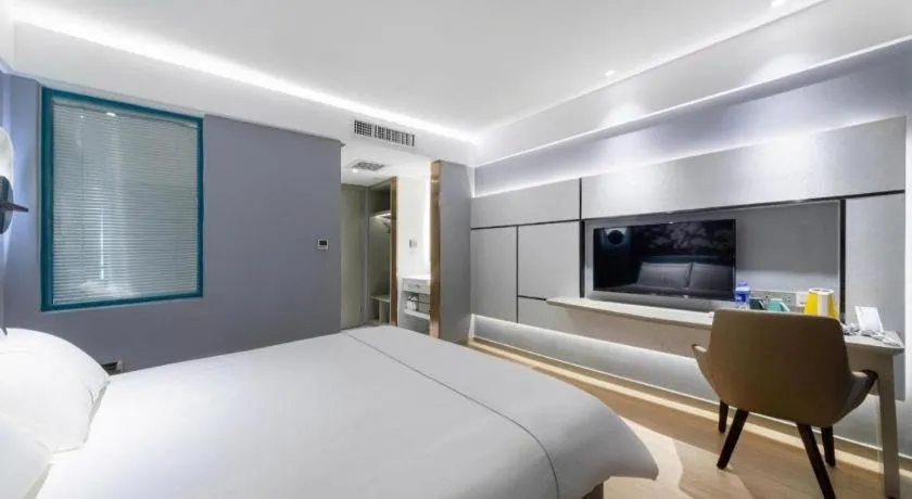 Bed in Magnotel Hotel Anshun West High-Speed Railway Station