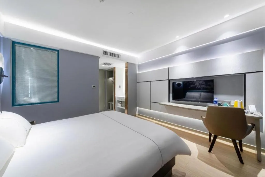 Bed in Magnotel Hotel Anshun West High-Speed Railway Station