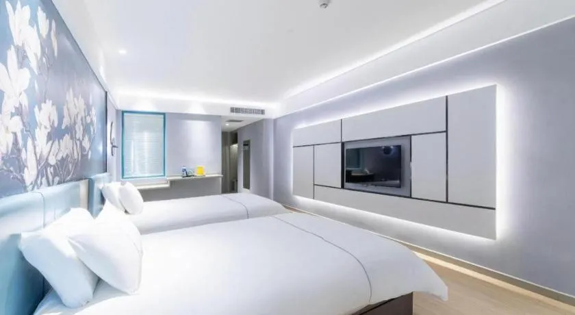 Bed in Magnotel Hotel Anshun West High-Speed Railway Station