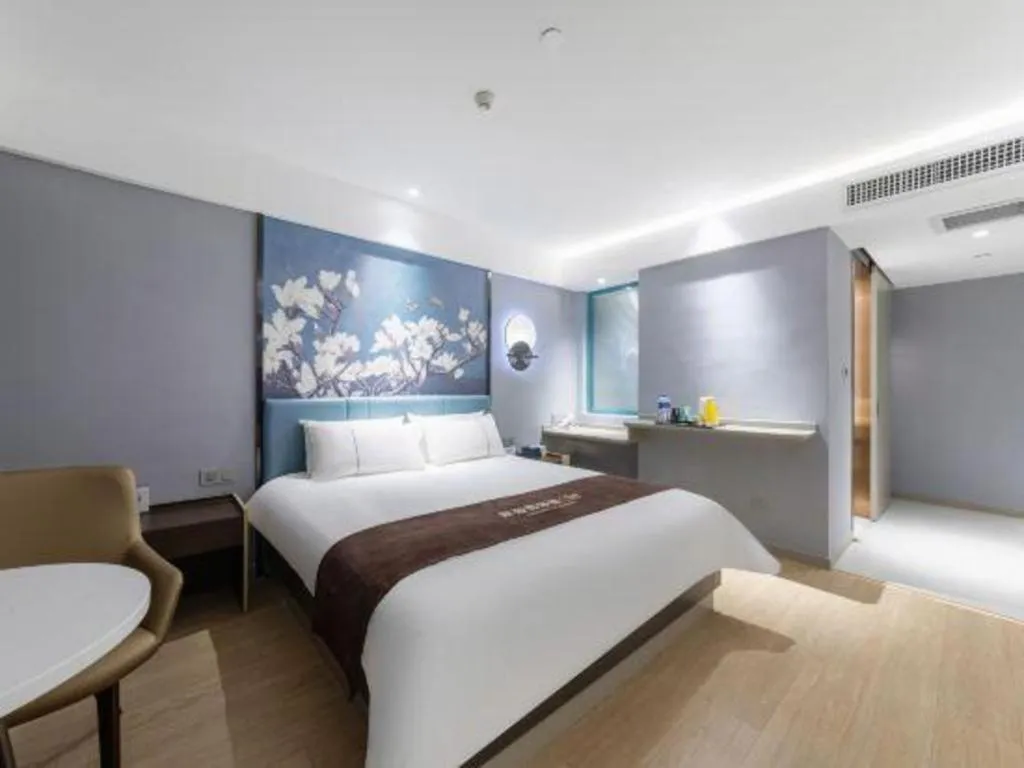 Bed in Magnotel Hotel Anshun West High-Speed Railway Station