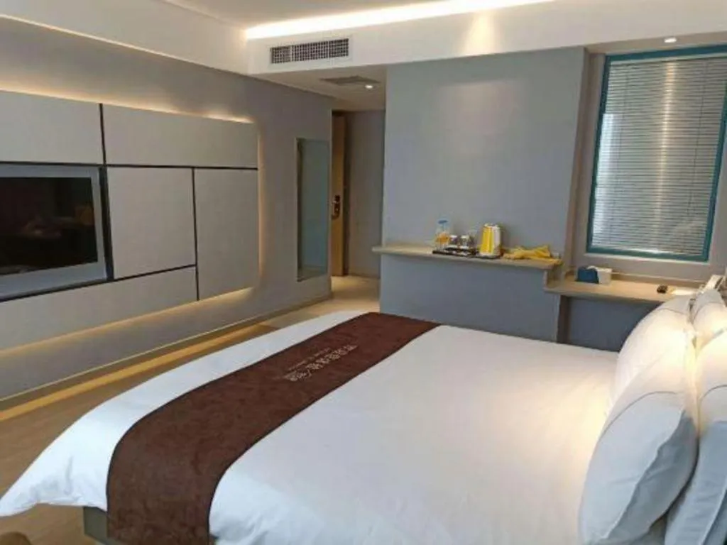 Bed in Magnotel Hotel Anshun West High-Speed Railway Station