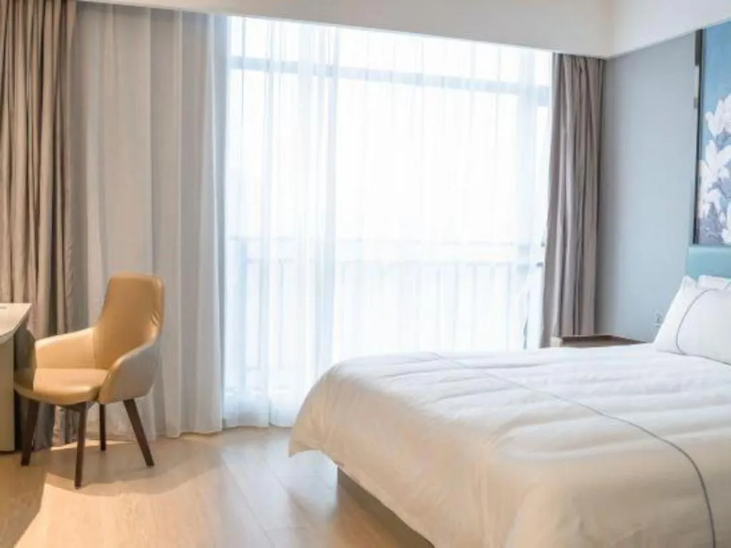 Bed in Magnotel Hotel Anshun West High-Speed Railway Station