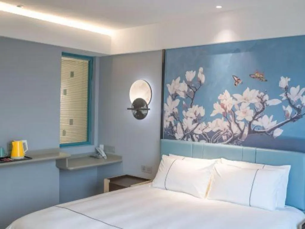 Bed in Magnotel Hotel Anshun West High-Speed Railway Station