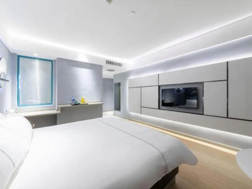 Bed in Magnotel Hotel Anshun West High-Speed Railway Station