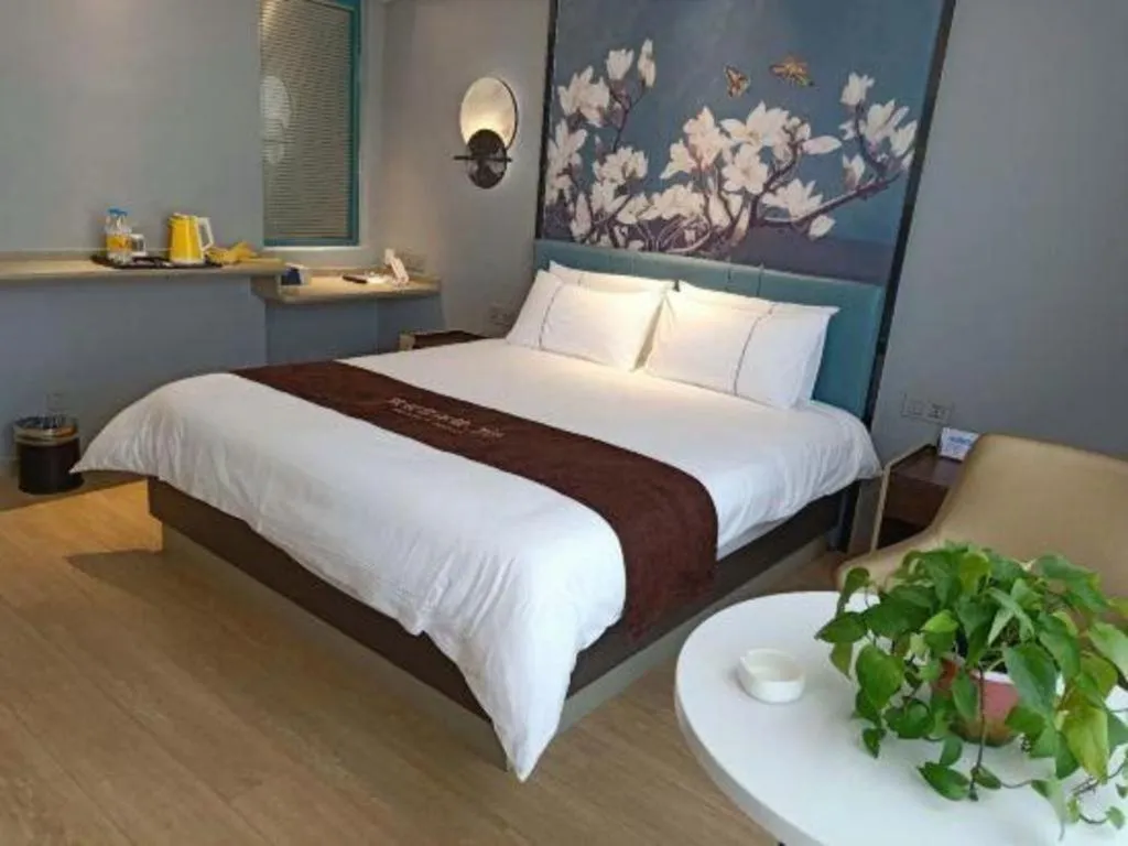 Bed in Magnotel Hotel Anshun West High-Speed Railway Station