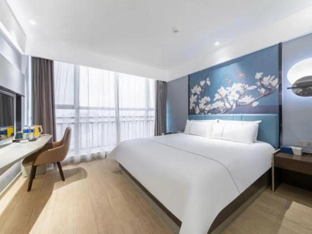 Bed in Magnotel Hotel Anshun West High-Speed Railway Station