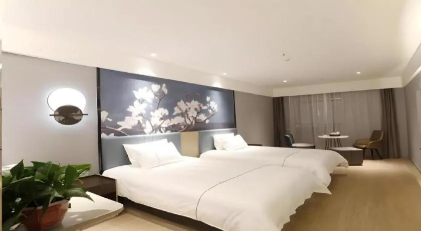 Bed in Magnotel Hotel Anshun West High-Speed Railway Station