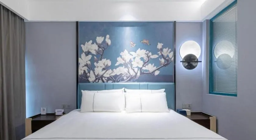 Bed in Magnotel Hotel Anshun West High-Speed Railway Station