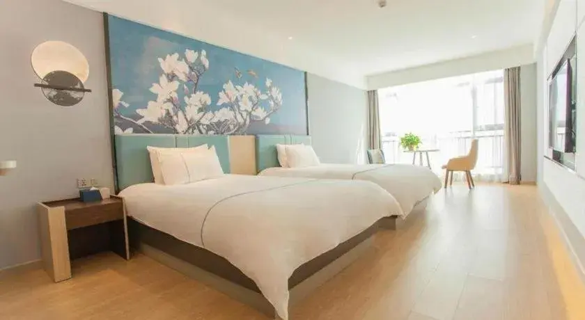 Bed in Magnotel Hotel Anshun West High-Speed Railway Station Bed in Magnotel Hotel Anshun West High-Speed Railway Station