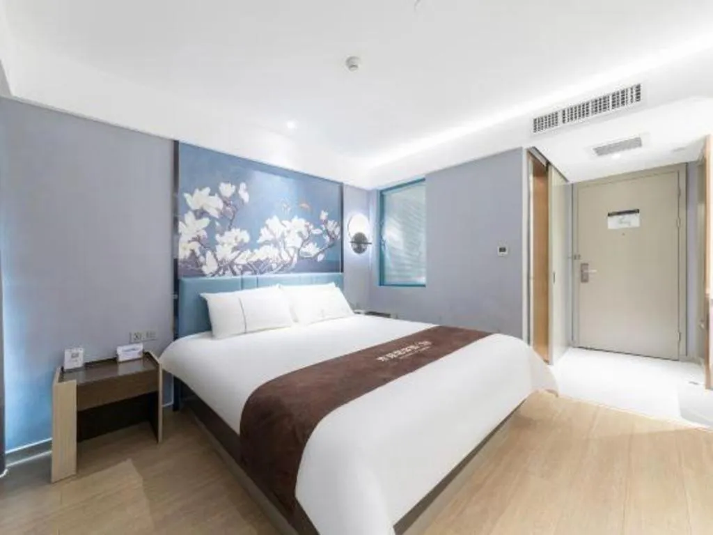 Bed in Magnotel Hotel Anshun West High-Speed Railway Station