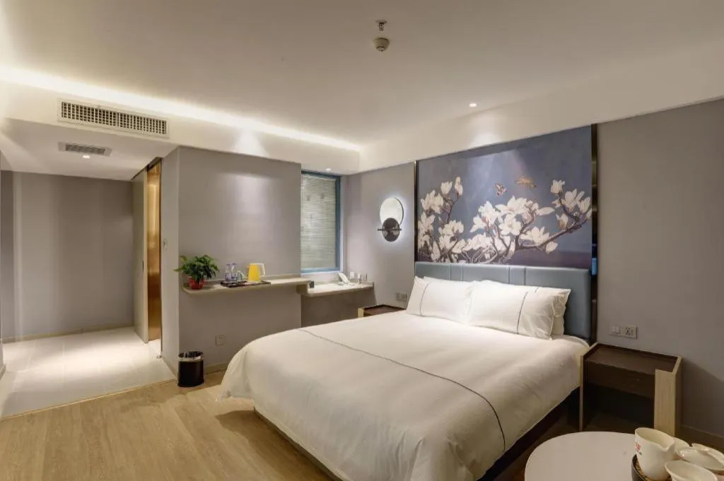 Bed in Magnotel Hotel Anshun West High-Speed Railway Station