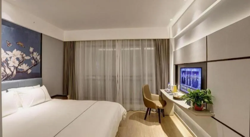 Bed in Magnotel Hotel Anshun West High-Speed Railway Station