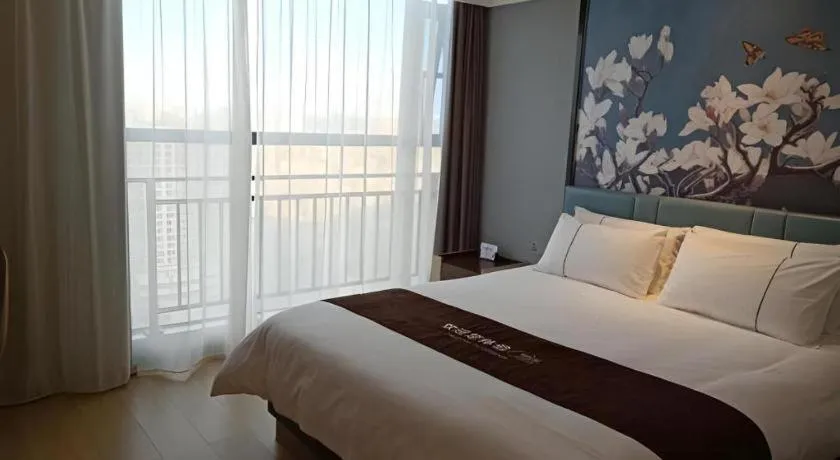 Bed in Magnotel Hotel Anshun West High-Speed Railway Station