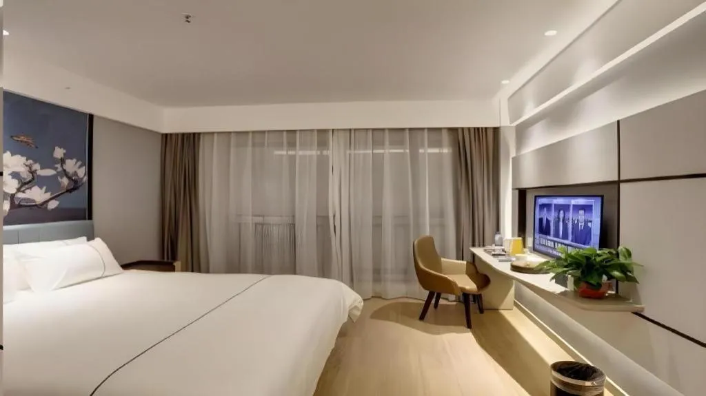 Bed in Magnotel Hotel Anshun West High-Speed Railway Station