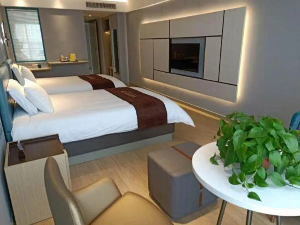 Bed in Magnotel Hotel Anshun West High-Speed Railway Station