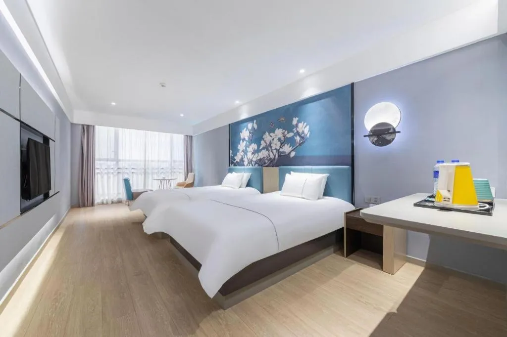 Bed in Magnotel Hotel Anshun West High-Speed Railway Station