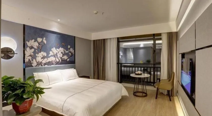 Bed in Magnotel Hotel Anshun West High-Speed Railway Station