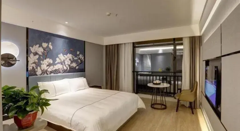 Bed in Magnotel Hotel Anshun West High-Speed Railway Station Bed in Magnotel Hotel Anshun West High-Speed Railway Station