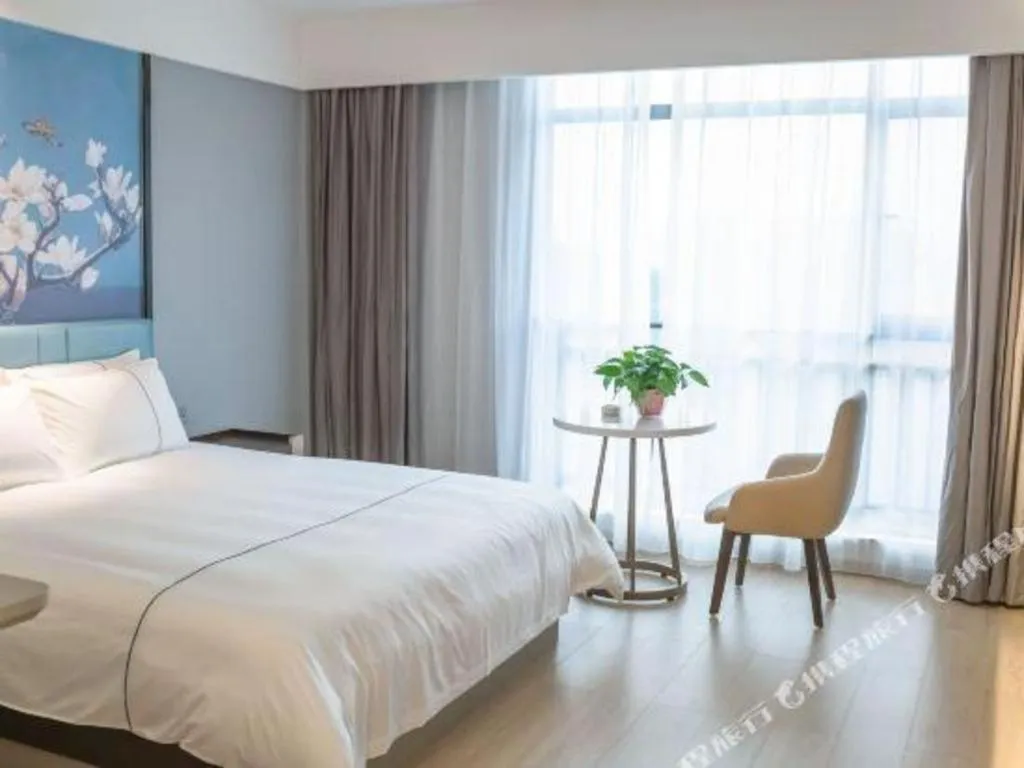 Bed in Magnotel Hotel Anshun West High-Speed Railway Station