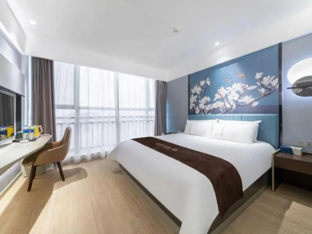 Bed in Magnotel Hotel Anshun West High-Speed Railway Station