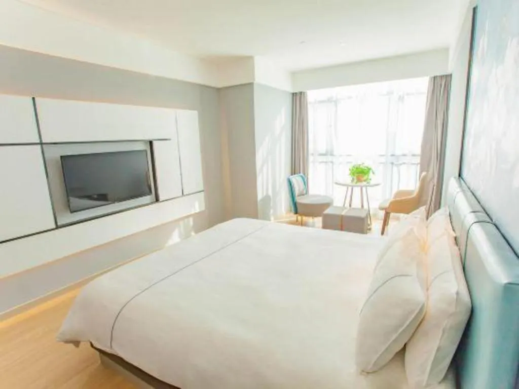 Bed in Magnotel Hotel Anshun West High-Speed Railway Station