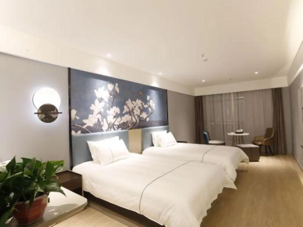 Bed in Magnotel Hotel Anshun West High-Speed Railway Station